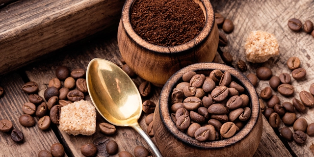 Roasted and grained coffee beans on a table