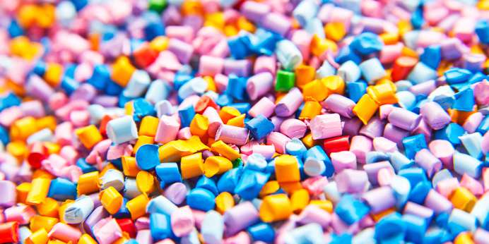 A colorful assortment of recycled plastic pellets